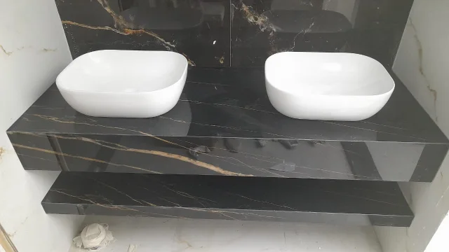 white basins black marble porcelain